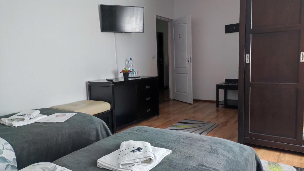 Postel nebo postele na pokoji v ubytování Casa de oaspeti Wallendorf Bistrita Unirea