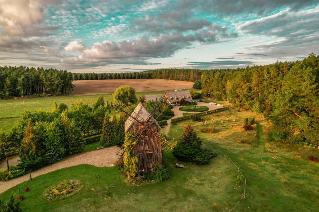 an aerial view of a house in a field at Pensjonat Uroczysko Zaborek in Janów Podlaski