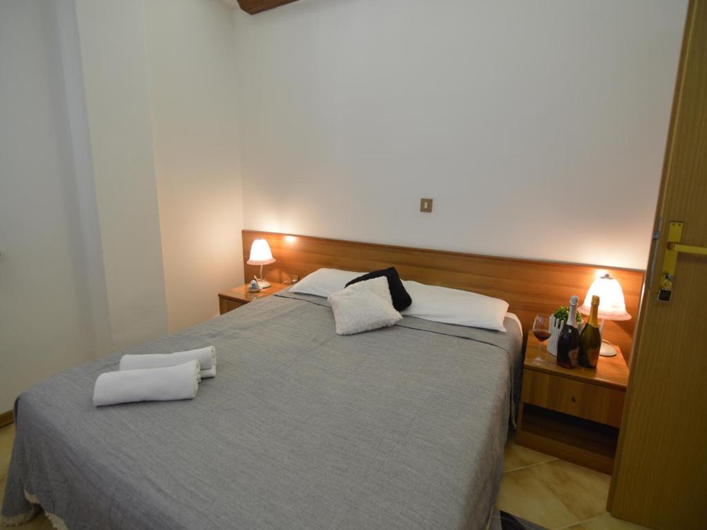 Postel nebo postele na pokoji v ubytování Bassanese Kastel