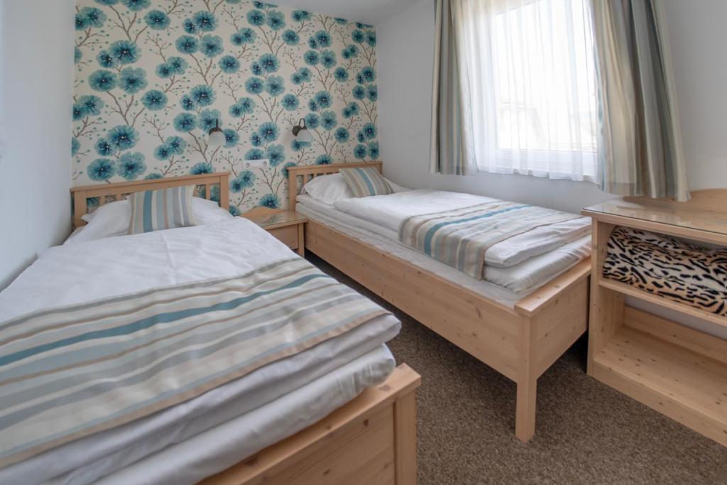 Postel nebo postele na pokoji v ubytování Guesthause Pr' Jozef