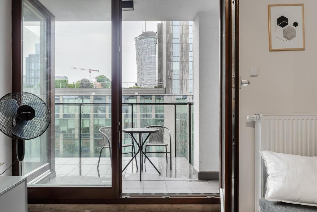 Posteľ alebo postele v izbe v ubytovaní Siedmiogrodzka P&O Serviced Apartments