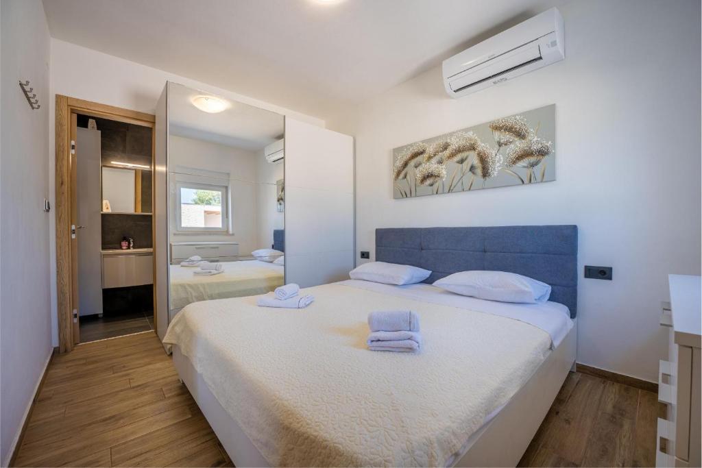 Posteľ alebo postele v izbe v ubytovaní Vacation house Ana