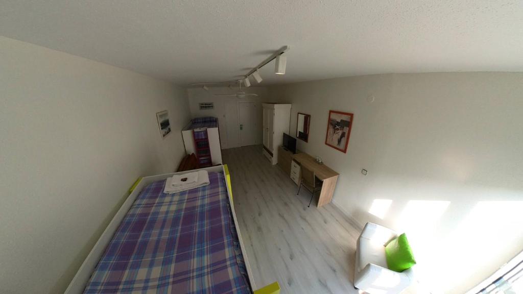 Postel nebo postele na pokoji v ubytování Pensión Pamplonabeds