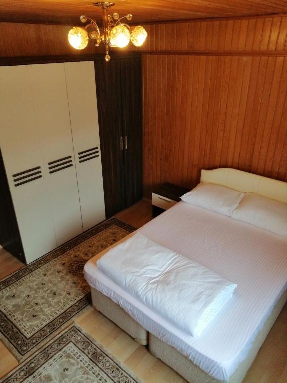 Postel nebo postele na pokoji v ubytování Mutlu apart ve bungalovs