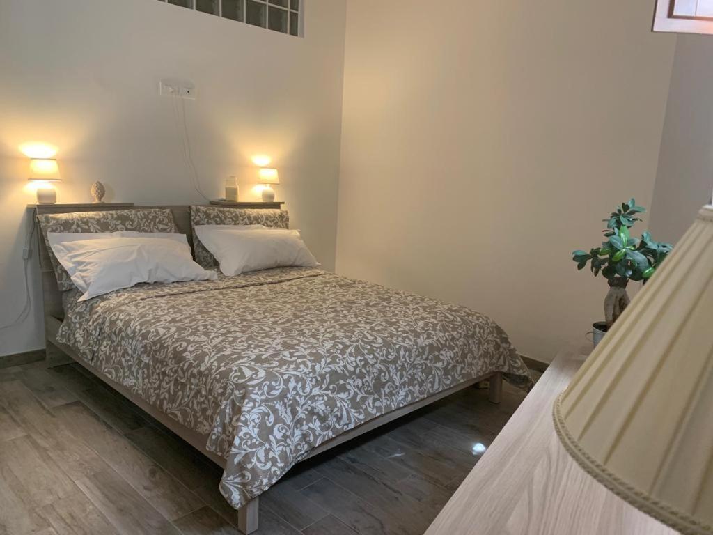 Ένα ή περισσότερα κρεβάτια σε δωμάτιο στο Casa de’ Sabini