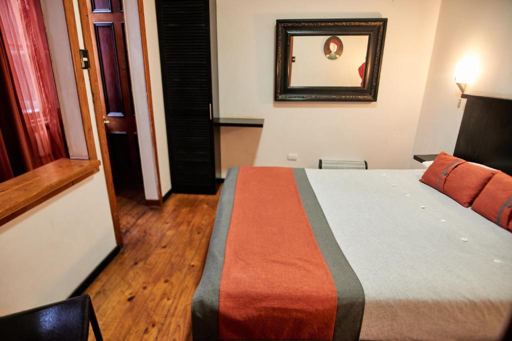 Postel nebo postele na pokoji v ubytování Maki Hostels & Suites Valparaiso