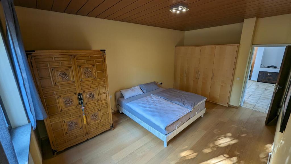 Postel nebo postele na pokoji v ubytování FeWo Sonnenschein Bungalow