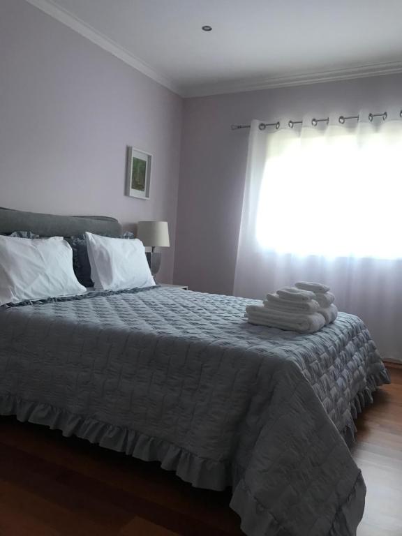 Postel nebo postele na pokoji v ubytování Camelias