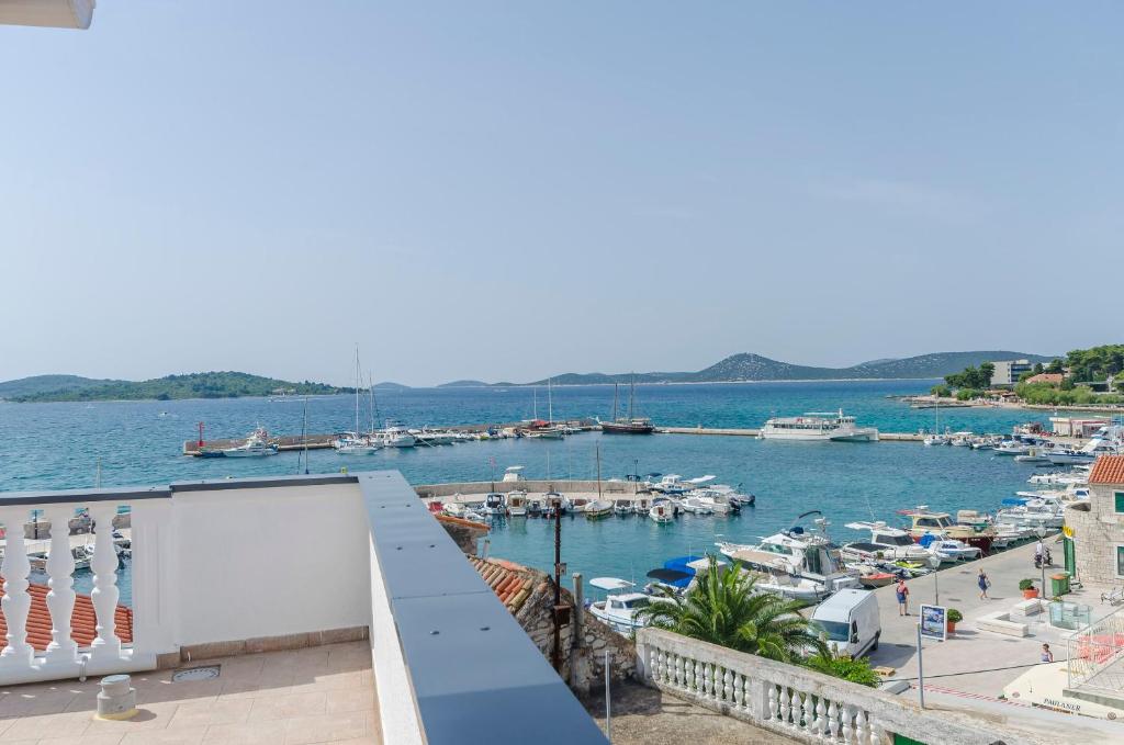 a view of a marina with boats in the water at Apartments Villa Vista Sol in Vodice