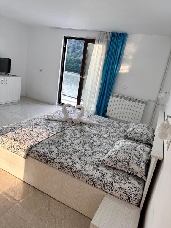 Postel nebo postele na pokoji v ubytování Villa Adam