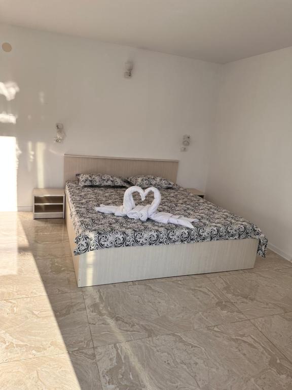 Postel nebo postele na pokoji v ubytování Villa Adam