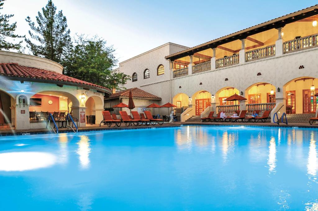 a large swimming pool in front of a building at Los Abrigados Resort and Spa in Sedona