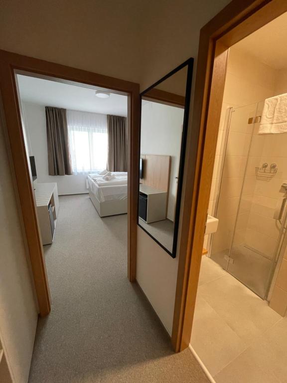 Postel nebo postele na pokoji v ubytování Comfort Pálava, Penzion Klentnice - Mikulov - Pálava
