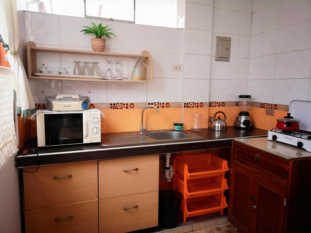 Kuchyň nebo kuchyňský kout v ubytování Casa Amarello