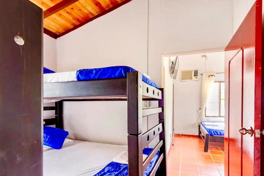 Postel nebo postele na pokoji v ubytování Finca Hacienda el Morichal