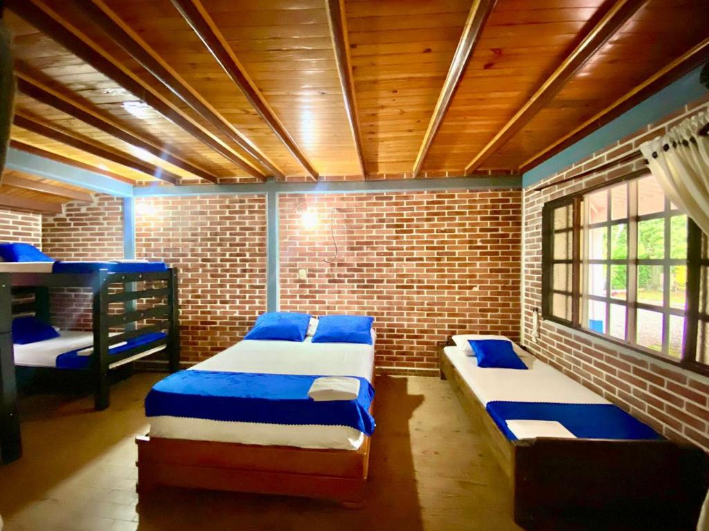 Postel nebo postele na pokoji v ubytování Finca Hacienda el Morichal