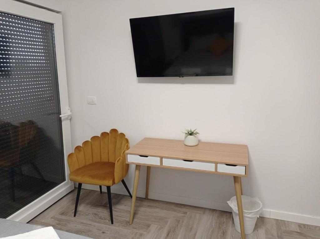 Telewizja i/lub zestaw kina domowego w obiekcie Villa S