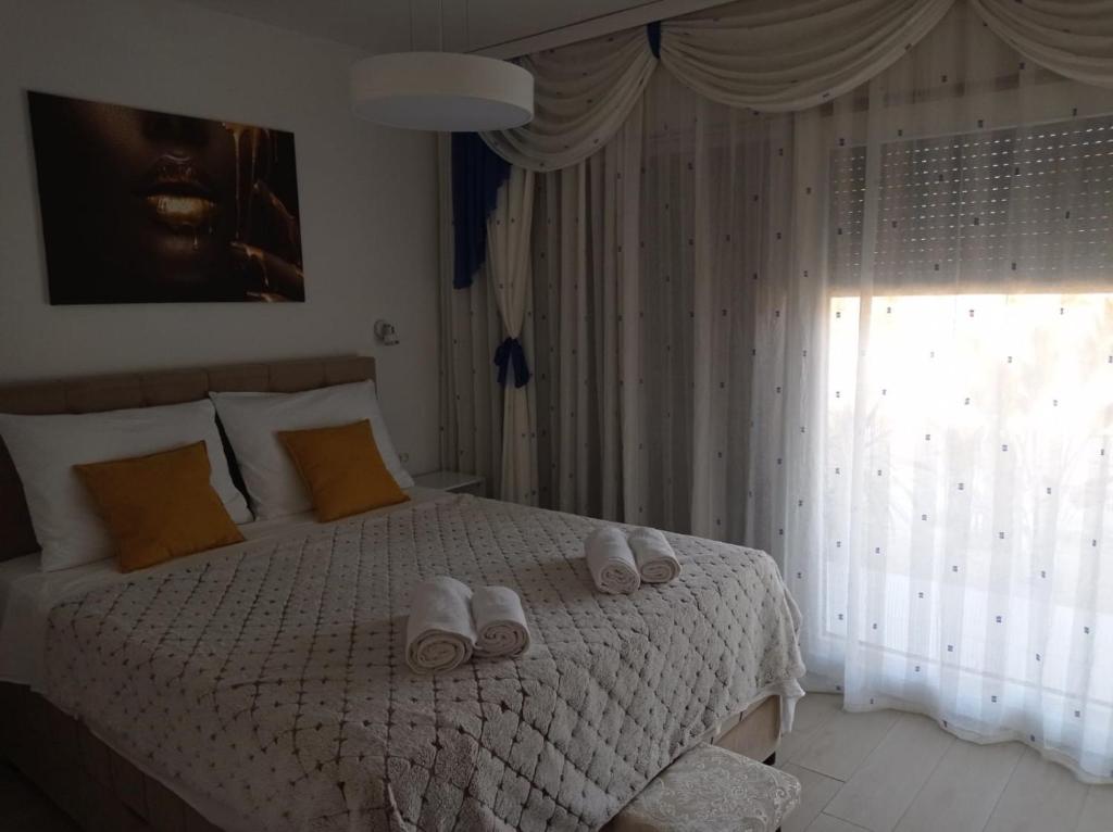 Łóżko lub łóżka w pokoju w obiekcie Villa S