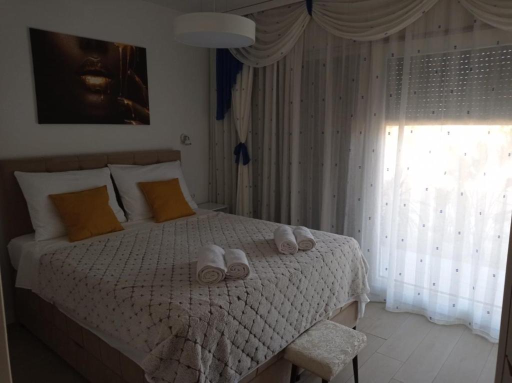 Łóżko lub łóżka w pokoju w obiekcie Villa S