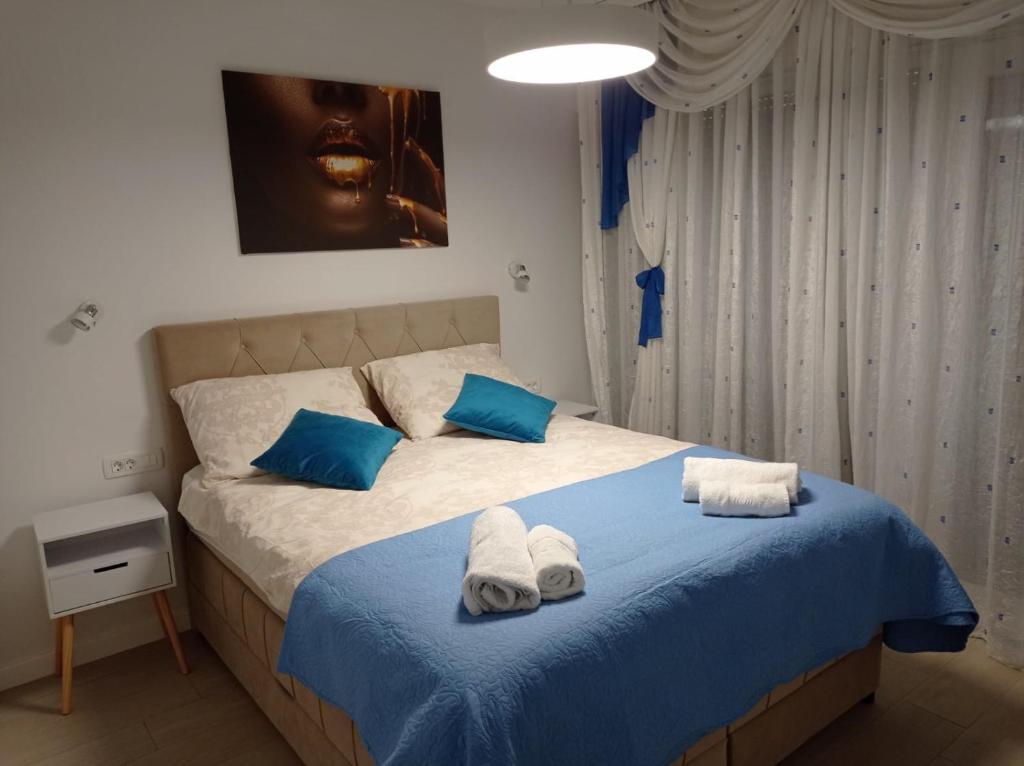 Łóżko lub łóżka w pokoju w obiekcie Villa S