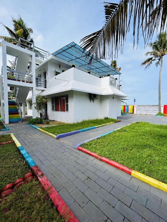 Zahrada ubytování Chameleon Beach Resort, Cherai