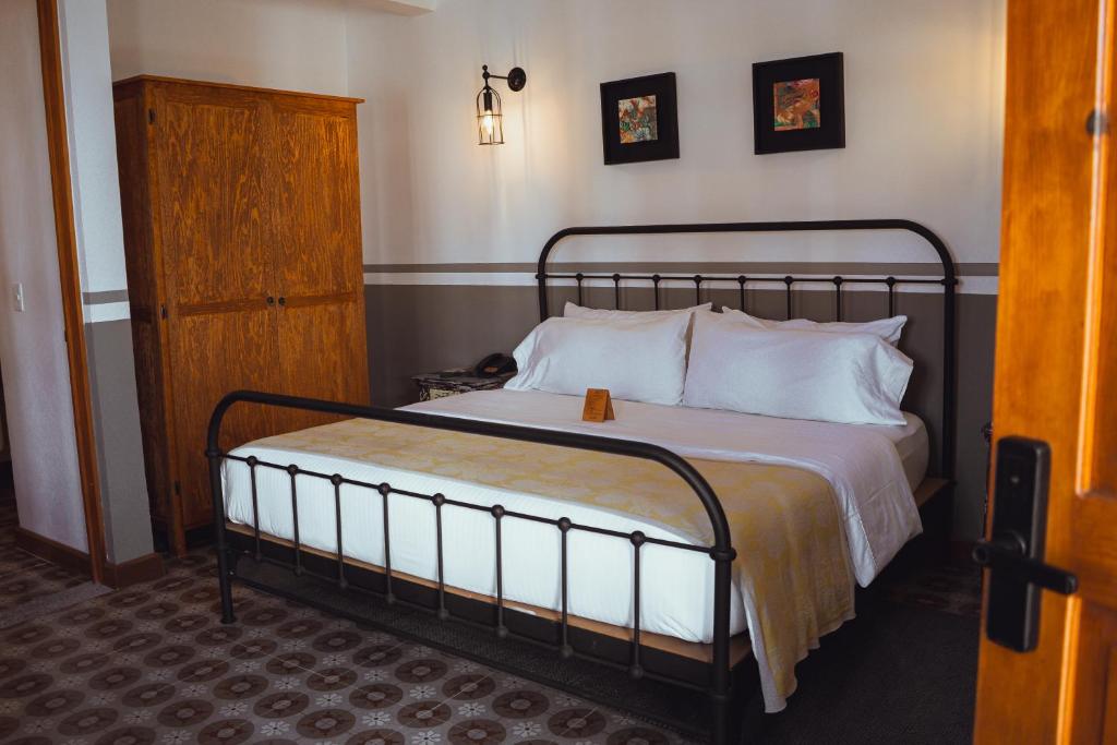Postel nebo postele na pokoji v ubytování Clandestino Hotel Pila Seca