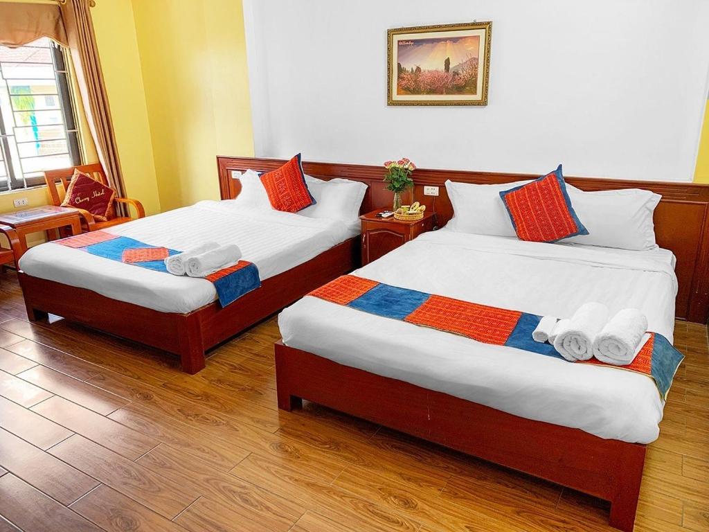 מיטה או מיטות בחדר ב-Cherry Hotel