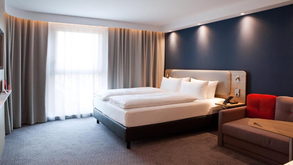 Postel nebo postele na pokoji v ubytování Holiday Inn Express Bochum by IHG