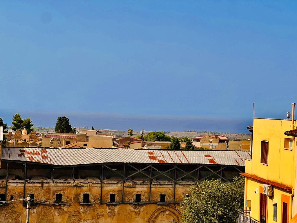 a view of a city with a building at casa vacanze VIVA House Sicily in Alcamo
