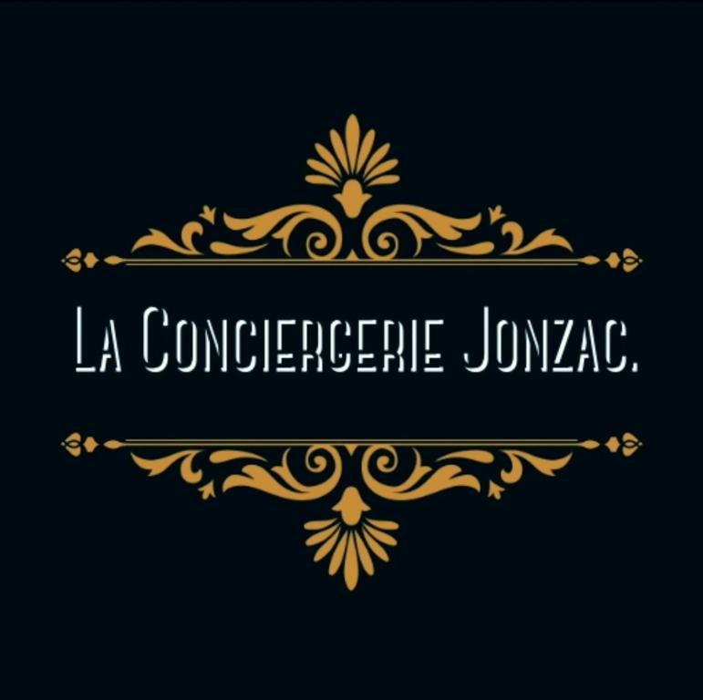 ein schwarzes und goldenes Logo mit den Worten la concorde jumeica in der Unterkunft Rubis in Jonzac
