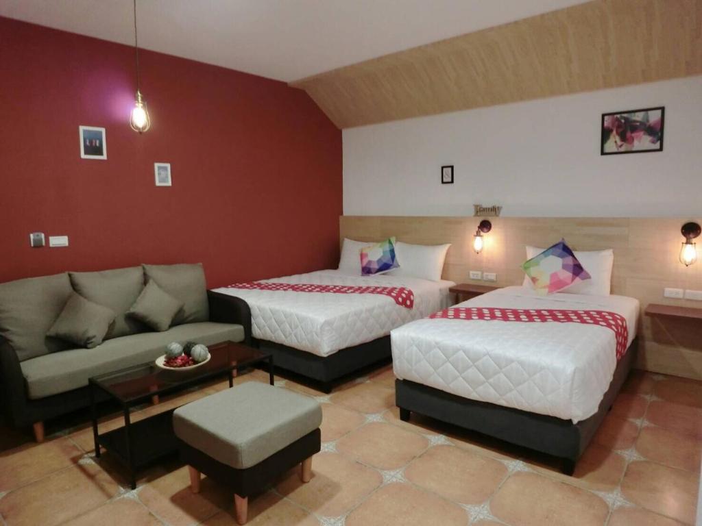 Postel nebo postele na pokoji v ubytování 康逸旅宿Comeinn2