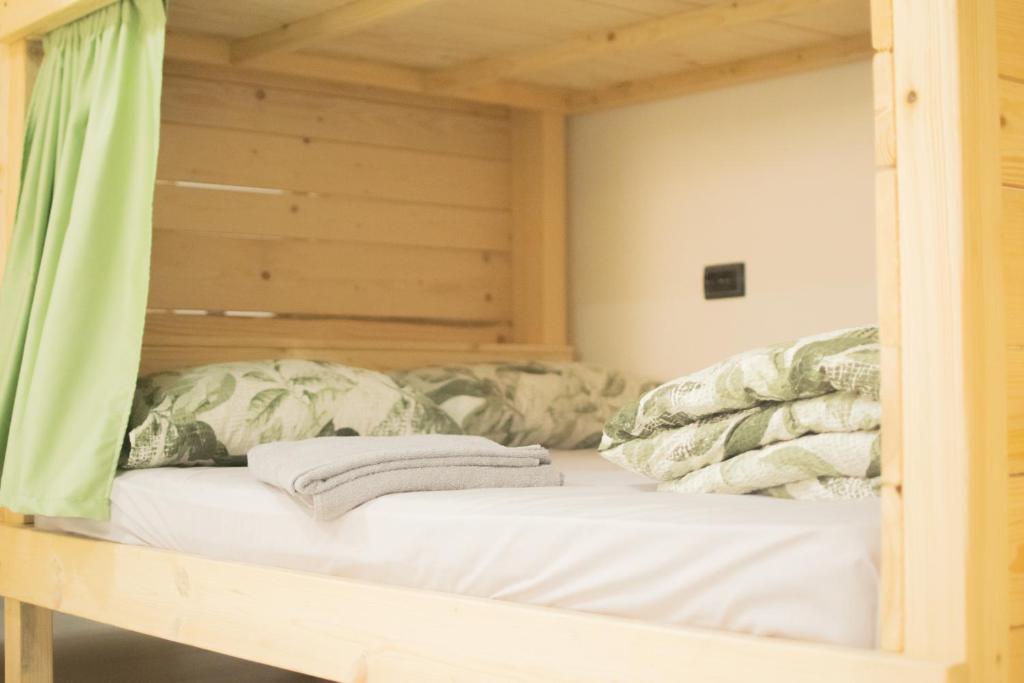 Postel nebo postele na pokoji v ubytování Hostel Kovači