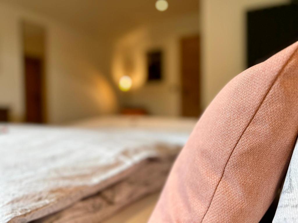 A bed or beds in a room at Gasthof Scherer