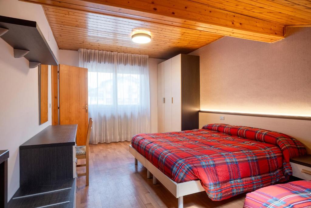 Postel nebo postele na pokoji v ubytování Residence Viola