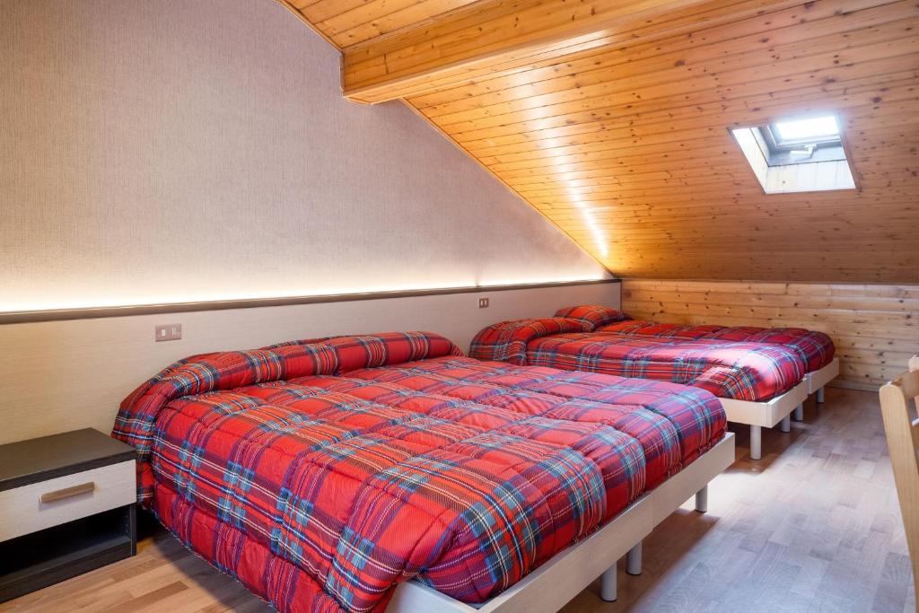 Postel nebo postele na pokoji v ubytování Residence Viola