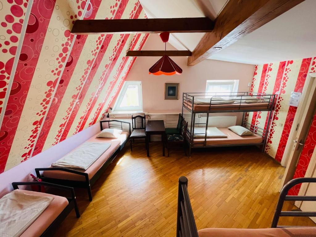 Postel nebo postele na pokoji v ubytování Mikalo House
