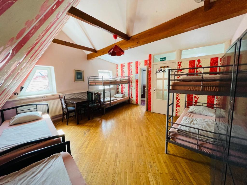 Postel nebo postele na pokoji v ubytování Mikalo House