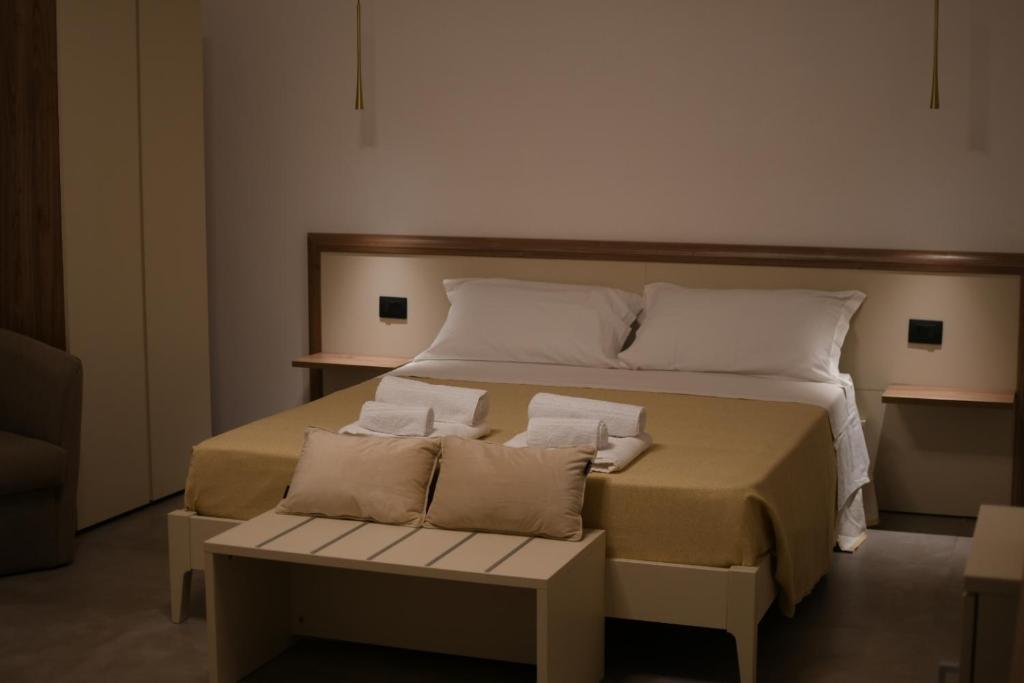 Posteľ alebo postele v izbe v ubytovaní Amaranto Guesthouse