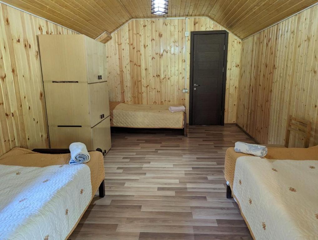Postel nebo postele na pokoji v ubytování Doxturi's sakhli