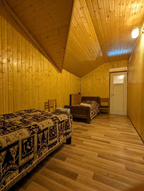 Postel nebo postele na pokoji v ubytování Doxturi's sakhli
