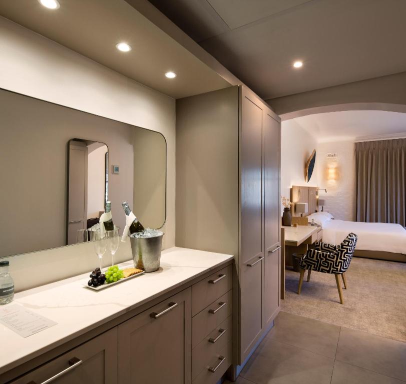 Cama ou camas em um quarto em Victoria & Alfred Hotel by NEWMARK