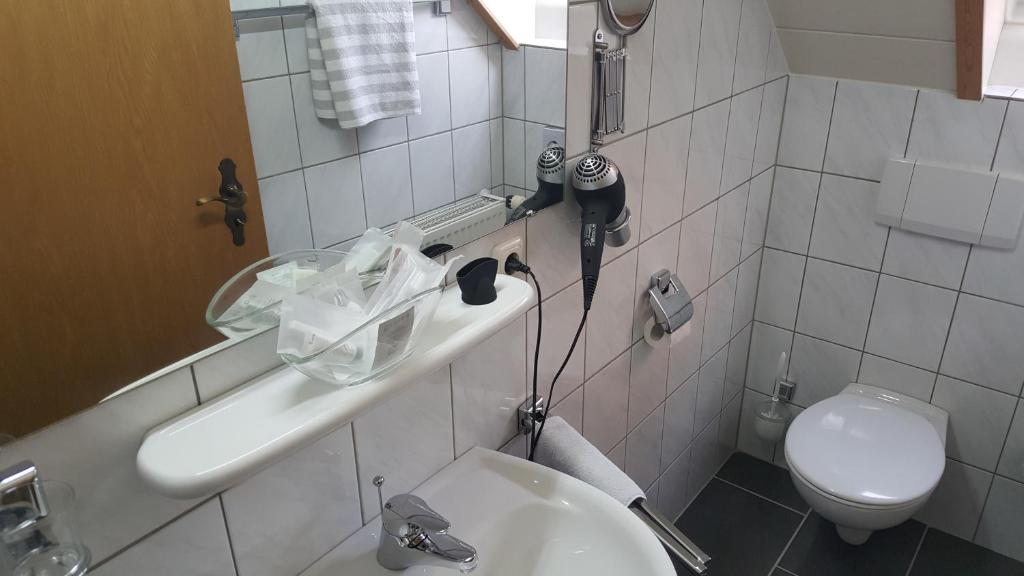 Koupelna v ubytování Hotel Residenz Stockstadt