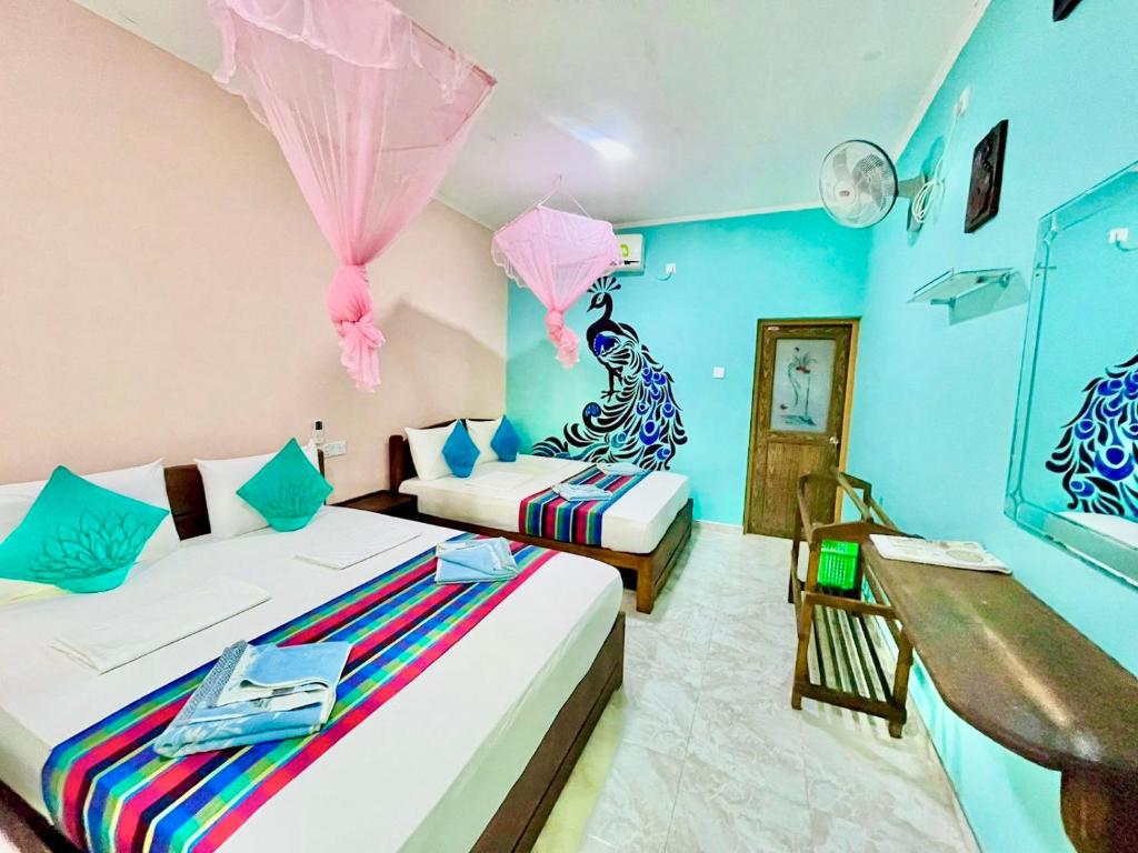 Voodi või voodid majutusasutuse Gangadiya Lodge toas