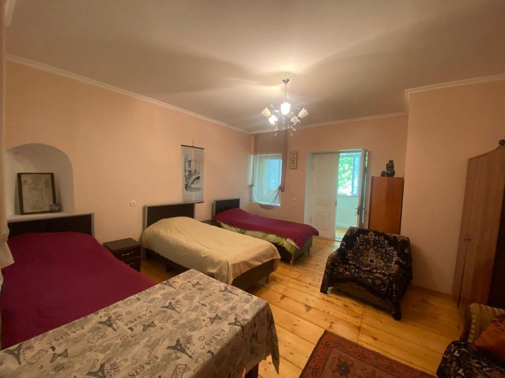 Postel nebo postele na pokoji v ubytování Seti Tower Guest House