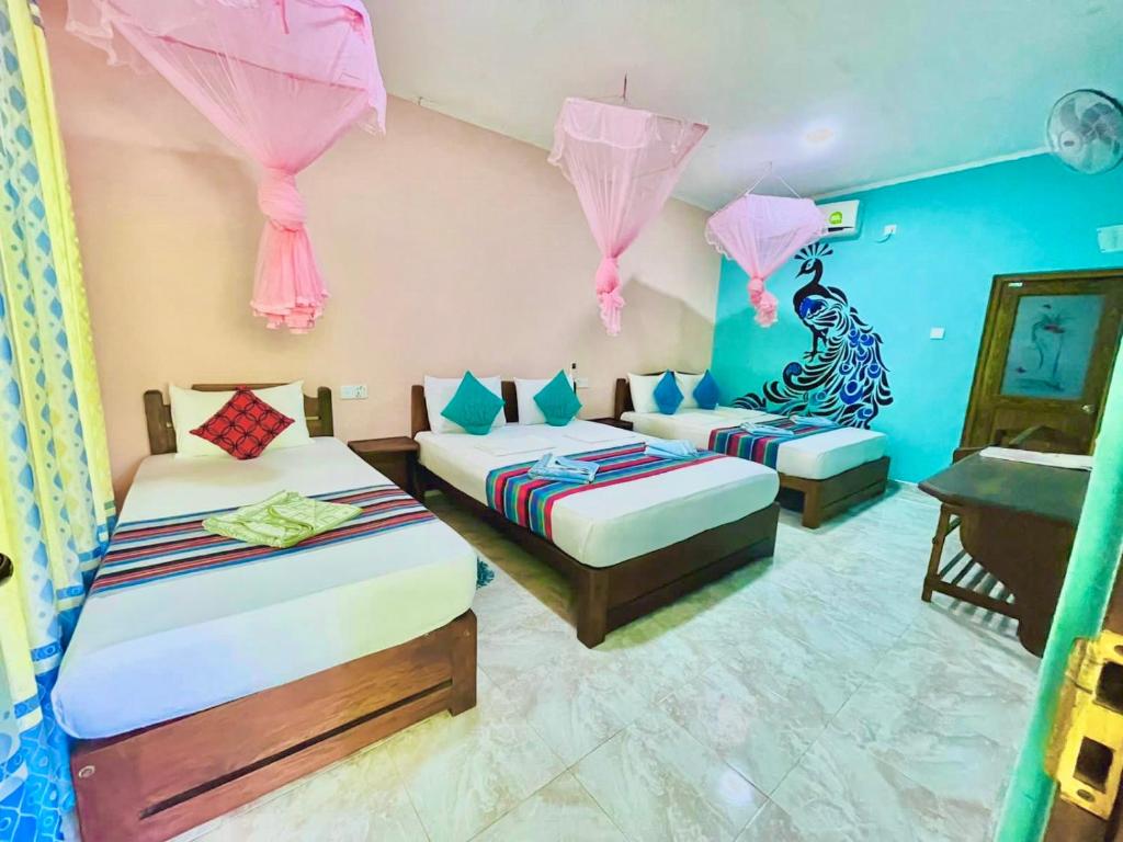 Voodi või voodid majutusasutuse Gangadiya Lodge toas