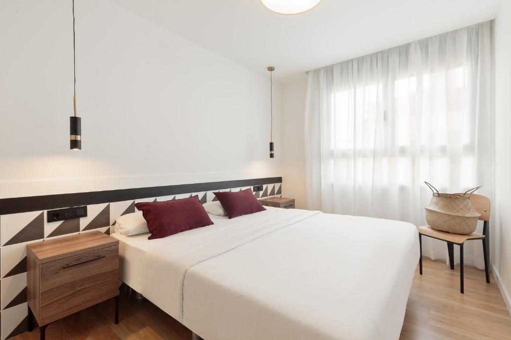 Posteľ alebo postele v izbe v ubytovaní Port Forum Apartments by Olala Homes