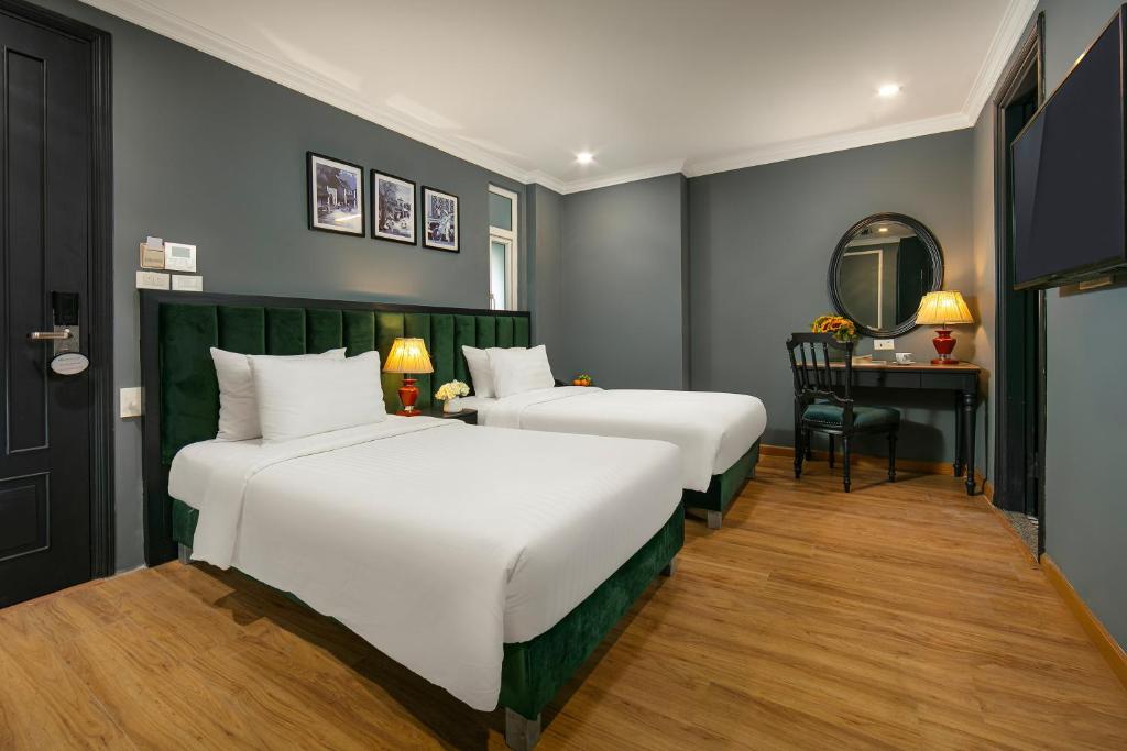 Postel nebo postele na pokoji v ubytování La Selva Premium Hotel
