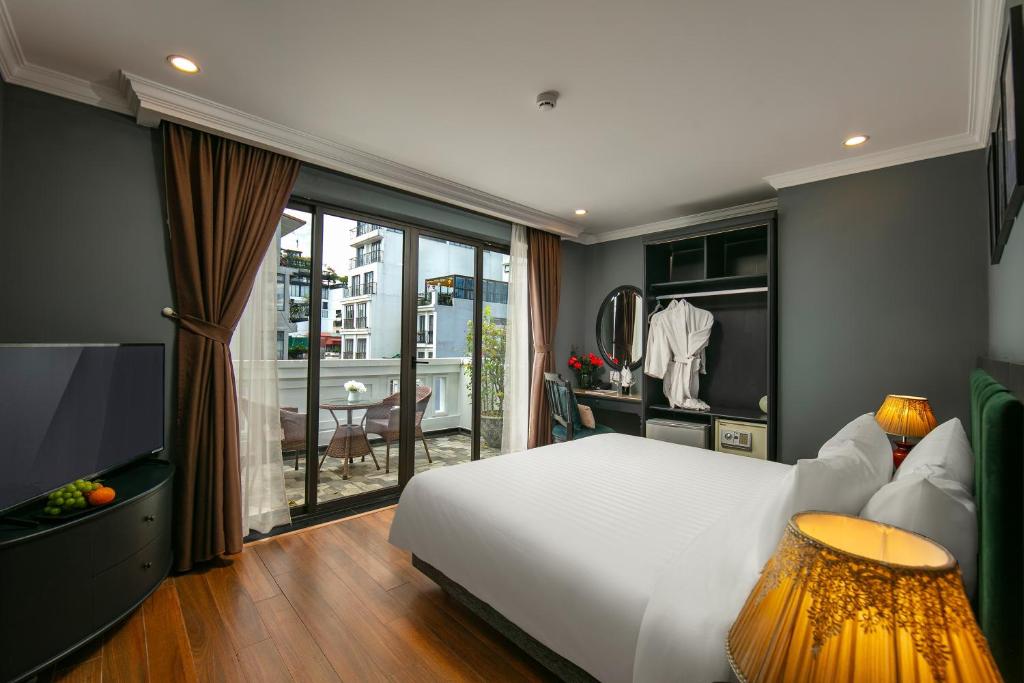 Postel nebo postele na pokoji v ubytování La Selva Premium Hotel