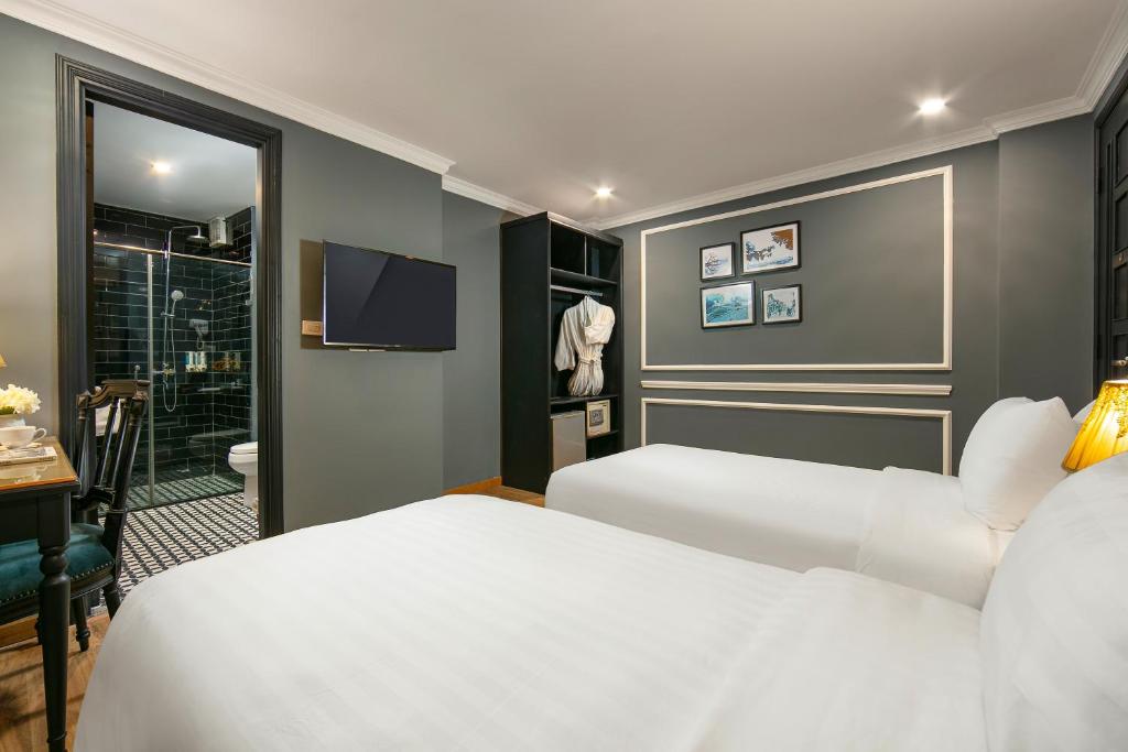Postel nebo postele na pokoji v ubytování La Selva Premium Hotel