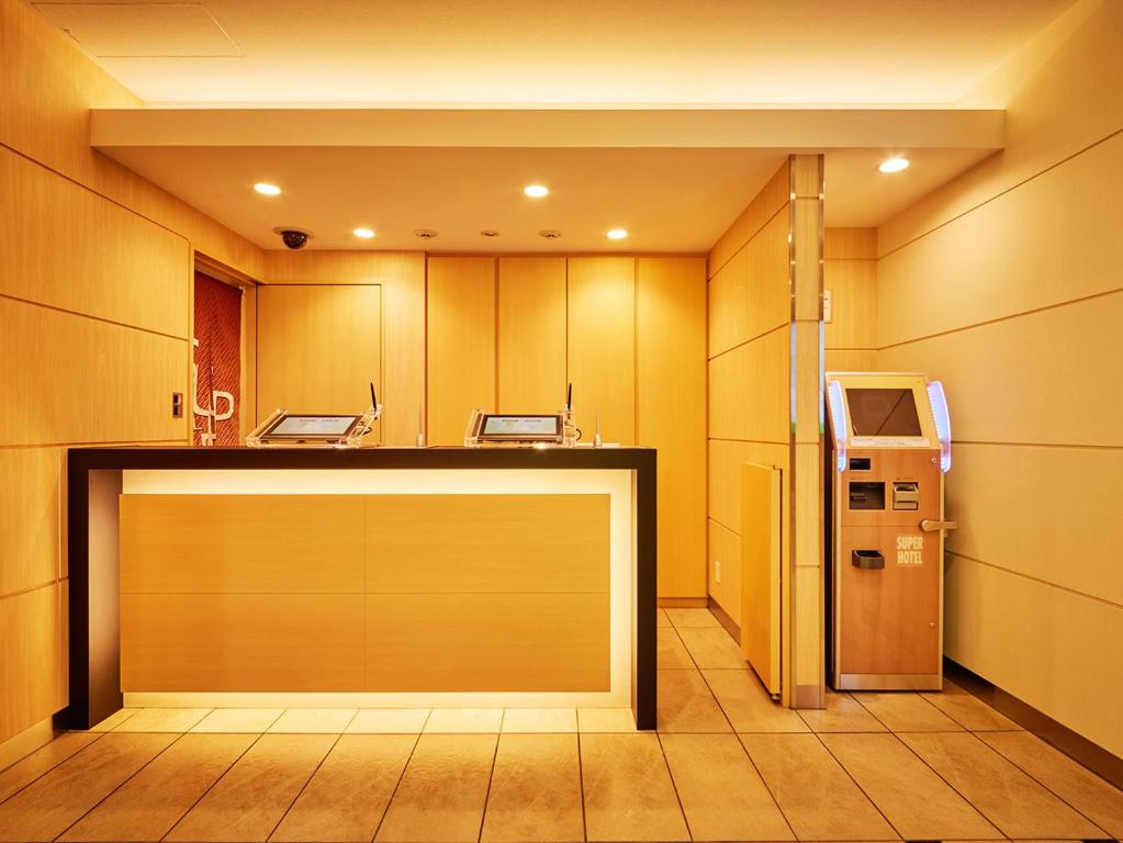 a garage door in the middle of a room at Super Hotel Akihabara Suehirocho in Tokyo